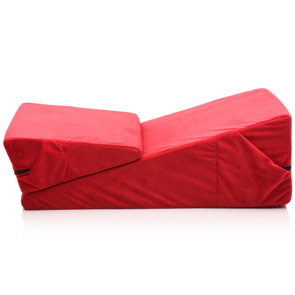 Red velvet foam wedge pillow set with a zippered cover.