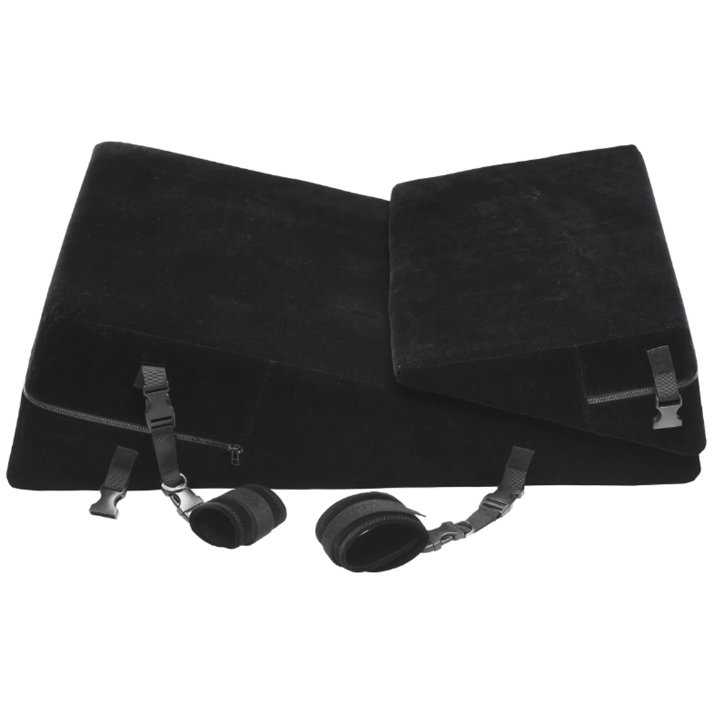 Black velvet bondage wedge pillow set with restraints.