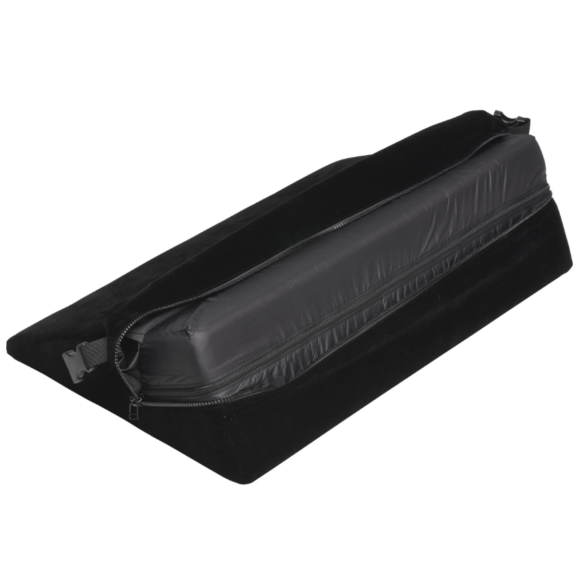 Black velvet bondage wedge pillow with a zippered inner cover and restraint cuffs.