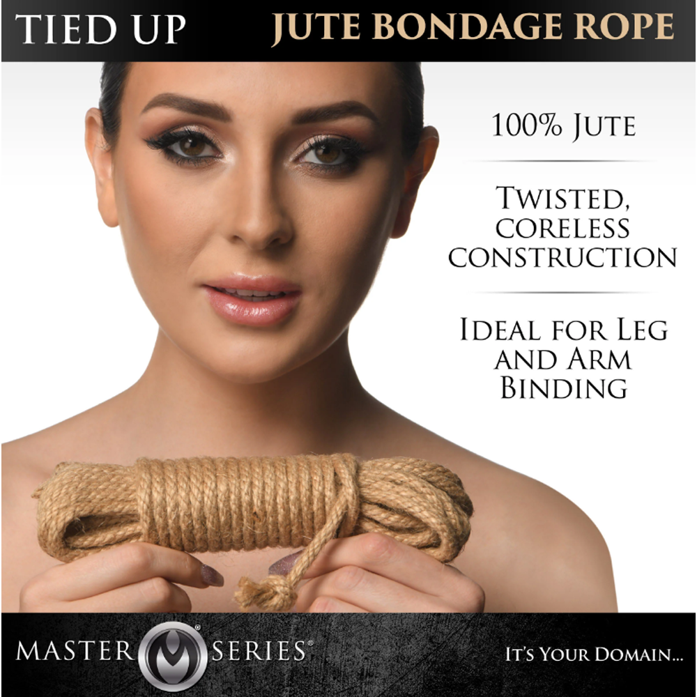 A woman holds a coil of natural jute bondage rope.