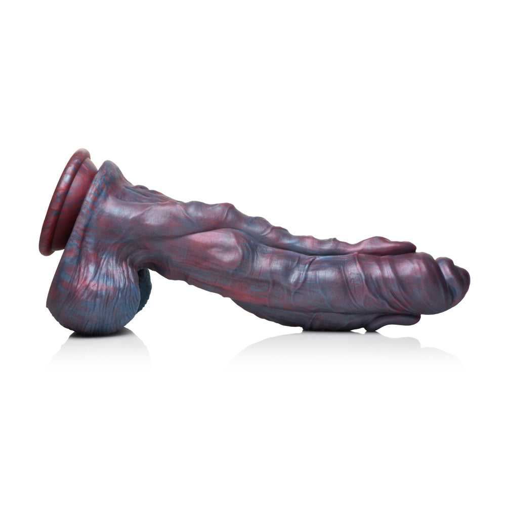 A purple and blue marbled silicone dildo with a suction cup base.