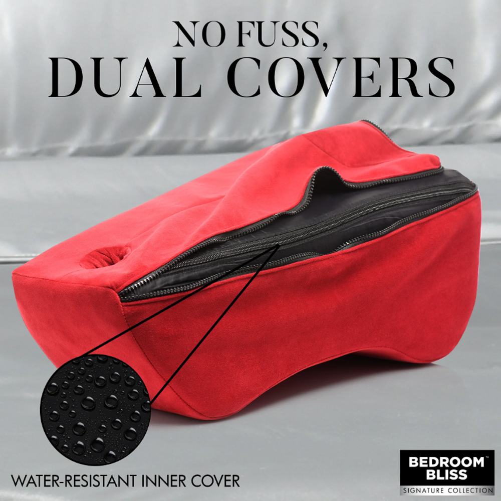 Red foam positioning pillow with dual covers, one of which is water-resistant.