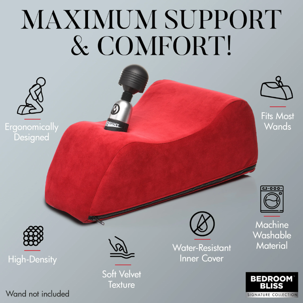 Red foam positioning pillow with wand holder, featuring ergonomic design and soft velvet texture.