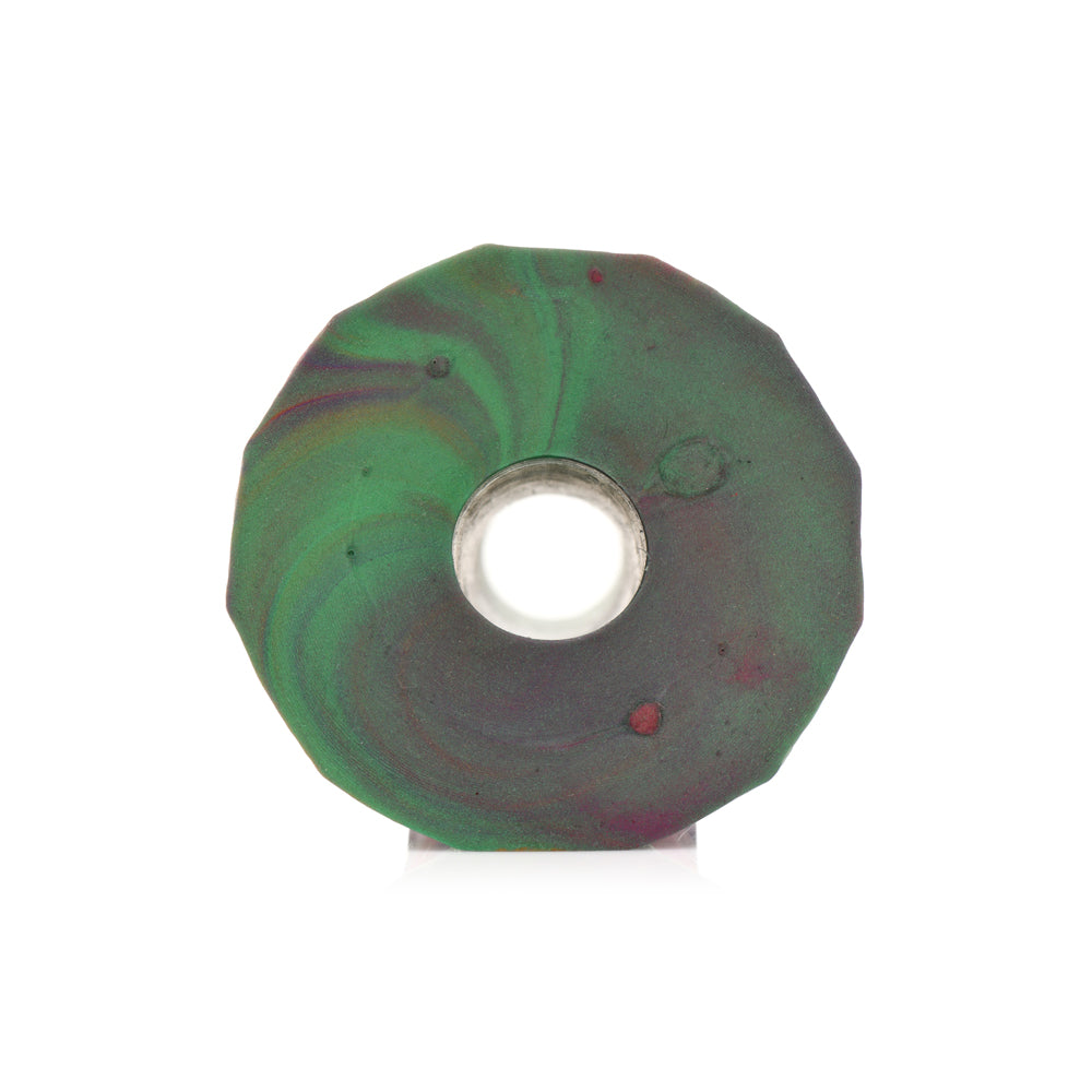 Multi-colored iridescent silicone dildo with a central hole.