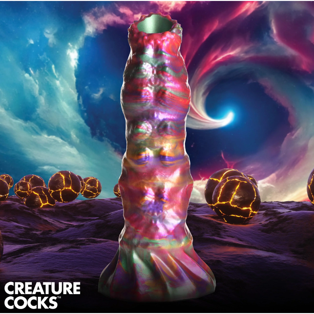 Iridescent fantasy dildo with ribbed texture and egg-like orbs.