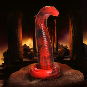 Red silicone king cobra fantasy dildo with textured scales and a suction cup base.