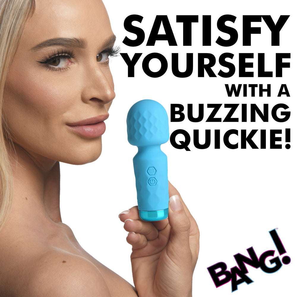 A blue silicone wand vibrator with textured head and two buttons.
