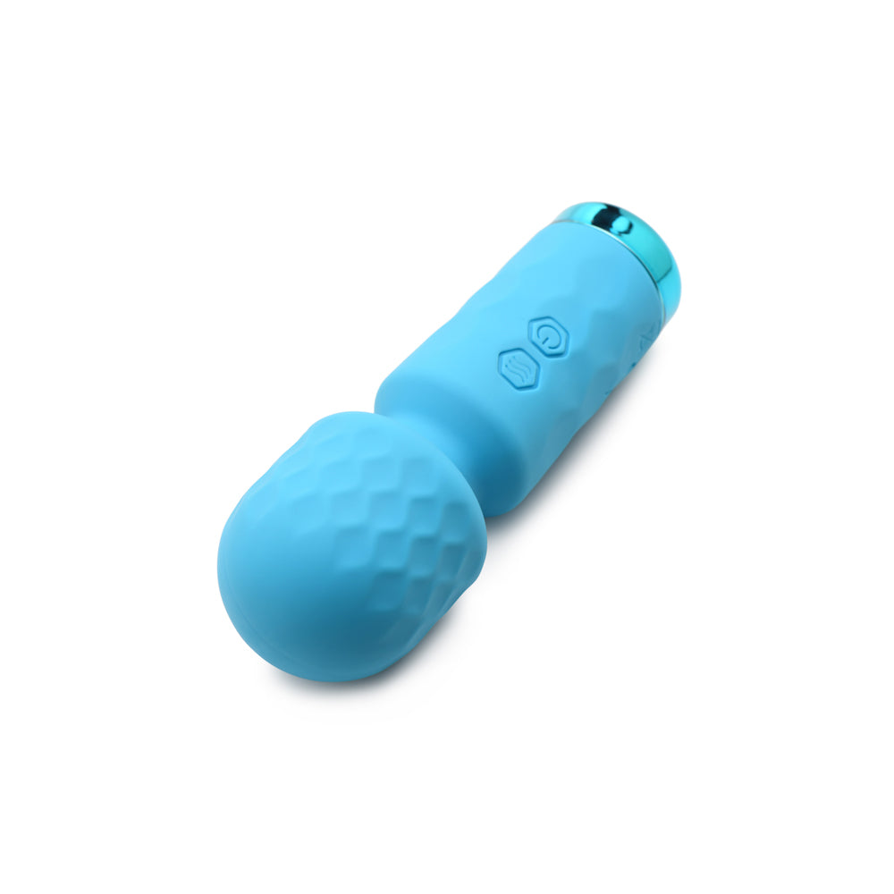 A blue silicone wand vibrator with a textured head and honeycomb pattern on the handle.