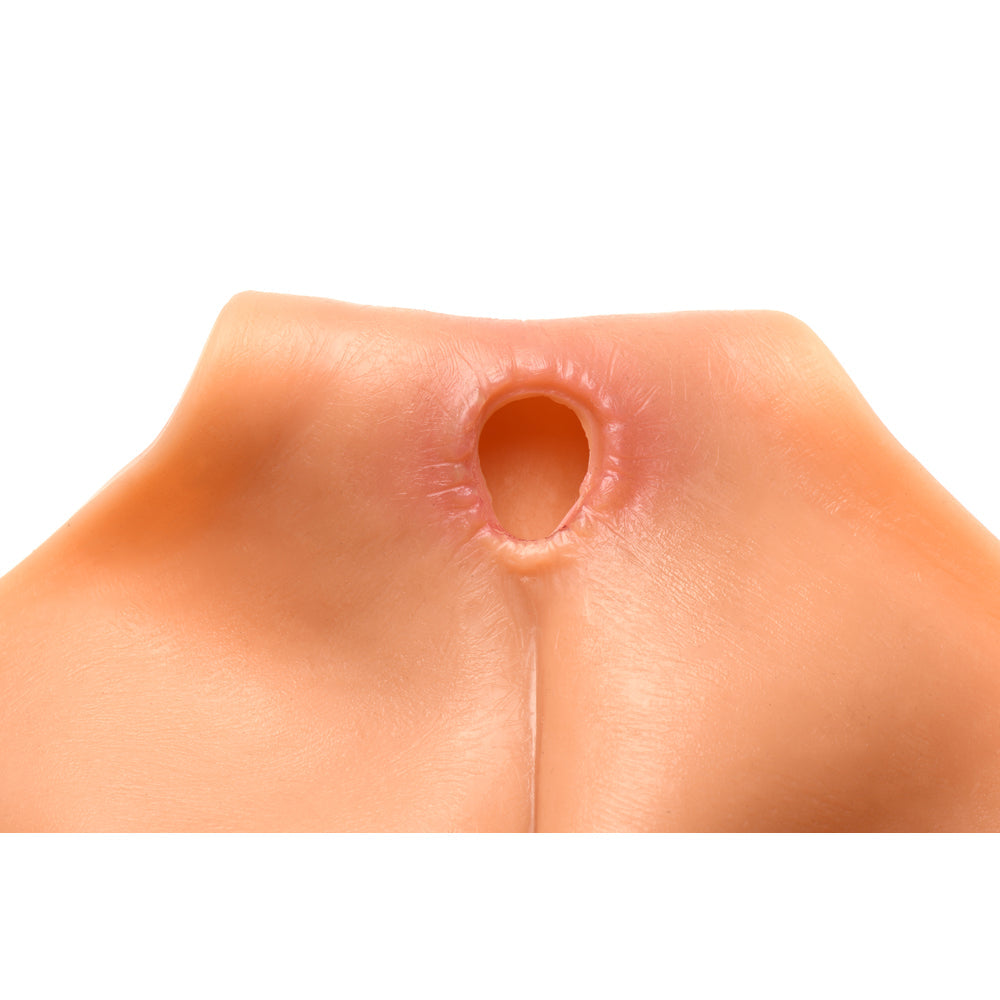 Realistic silicone vulva panties with anal access.