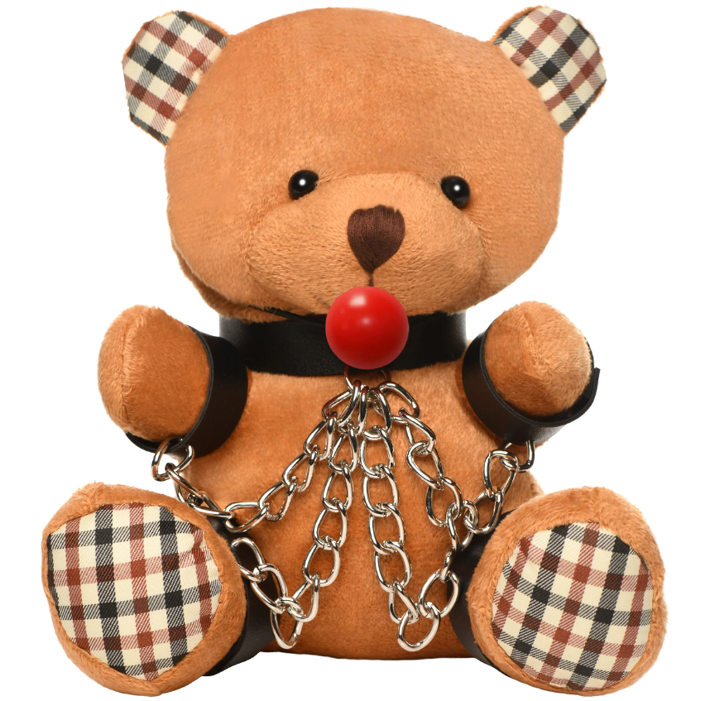 Brown teddy bear with a ball gag, collar, wrist cuffs, and chains.