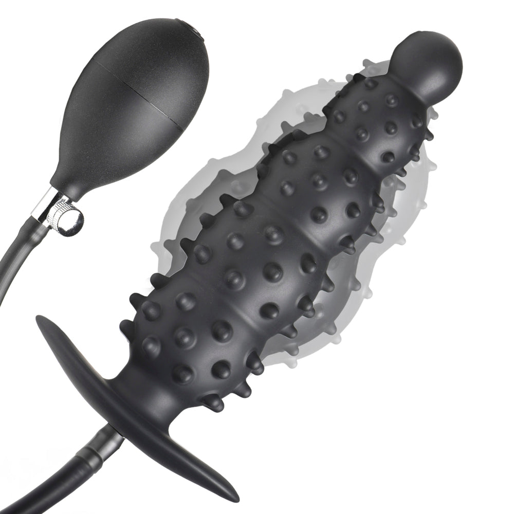 Inflatable nubbed silicone anal plug with a bulb pump.
