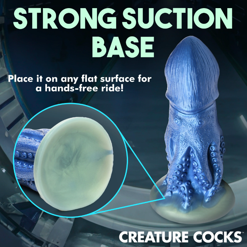 Blue octopus creature dildo with suction cup base.