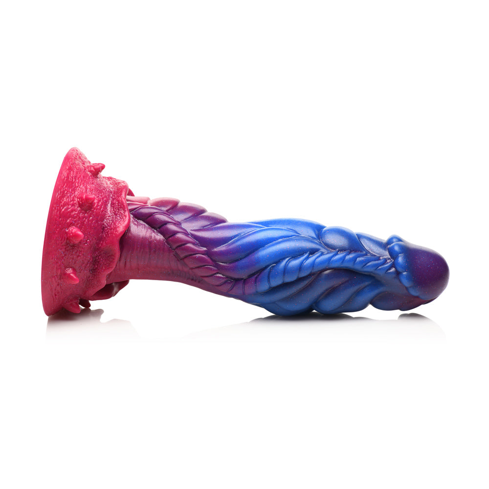 Alien-shaped silicone dildo with suction cup in blue, purple, and pink.