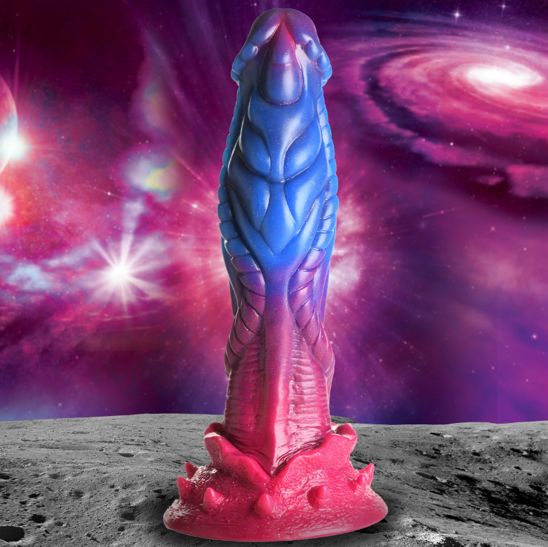 Alien-themed silicone dildo with blue, purple, and pink colors.