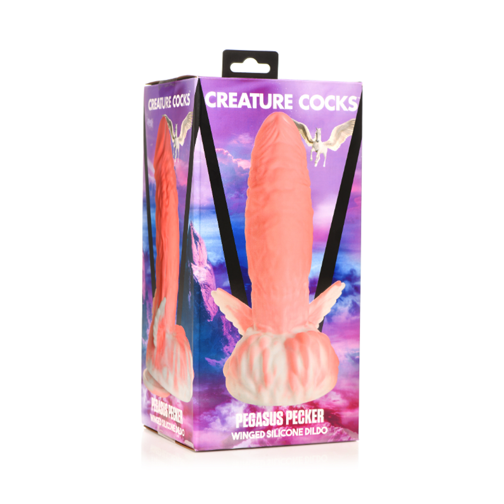 A pink Pegasus dildo with wings and a suction cup on a box.