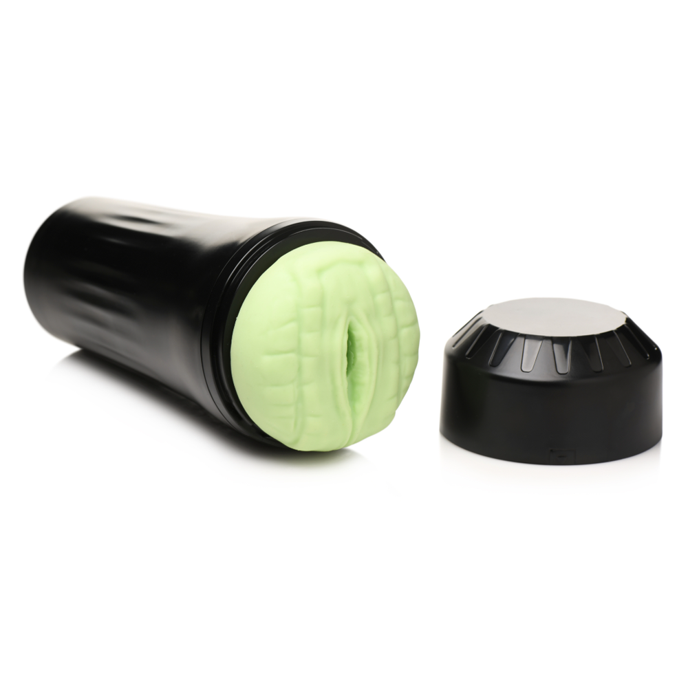Black masturbator with a textured green insert and a black cap.