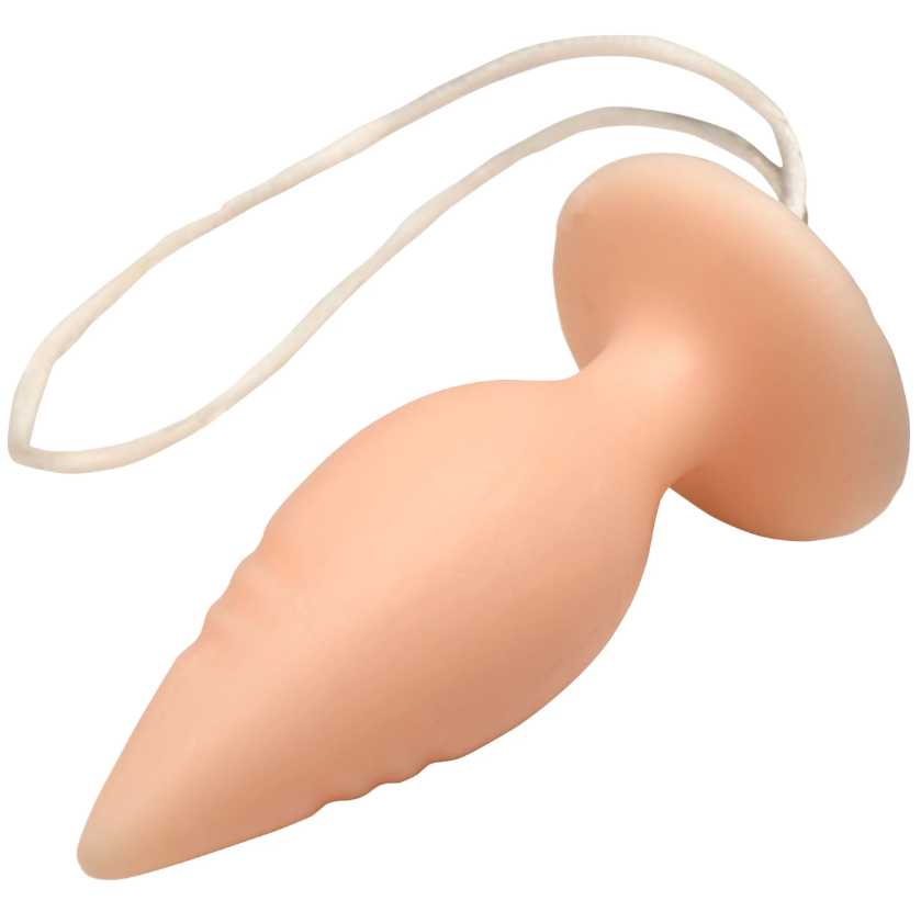Peach-colored butt plug shaped soap on a rope.