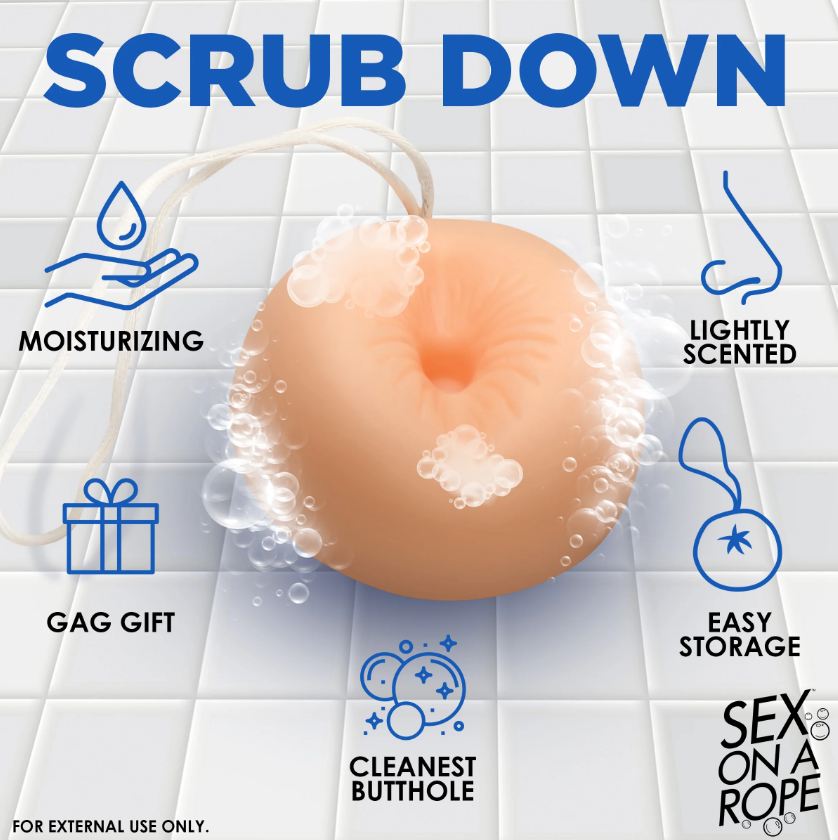 Butt plug shaped soap on a rope, peach scented.