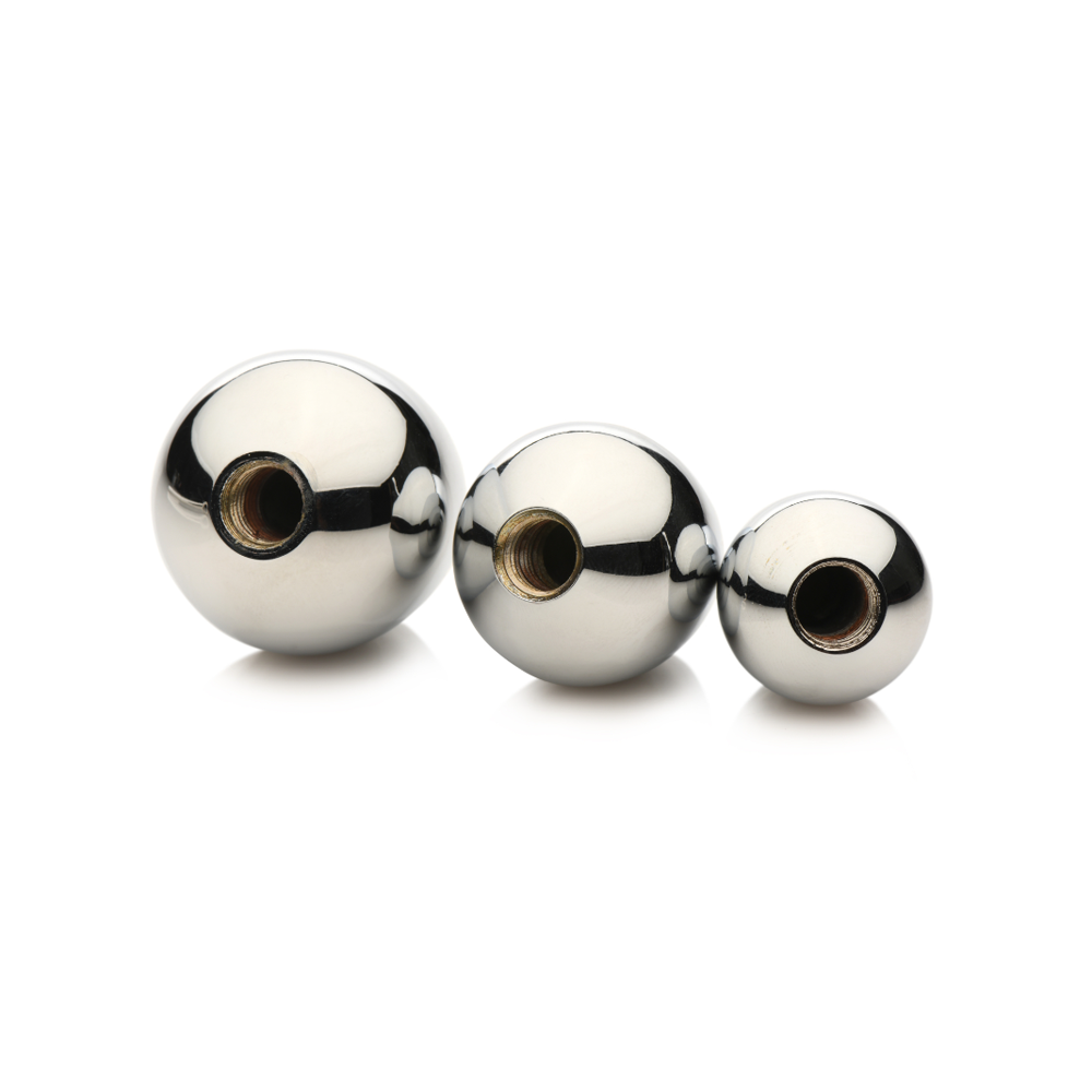 Three polished metal anal plugs of varying sizes with threaded openings.