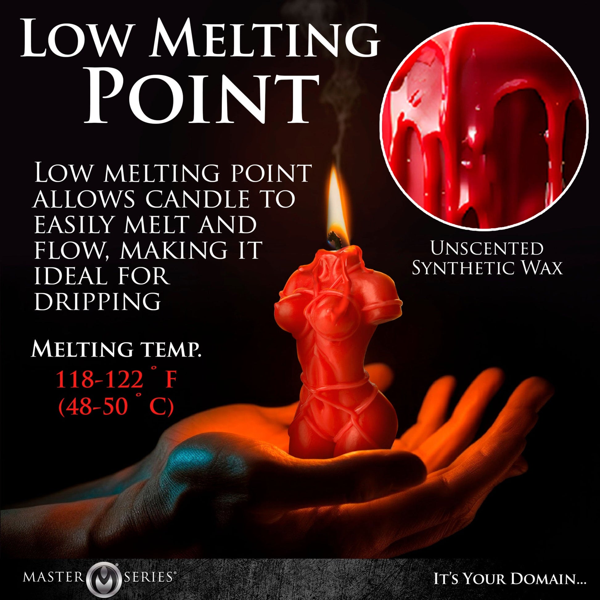 A red, low-temp wax torso candle with a flame held in a hand.