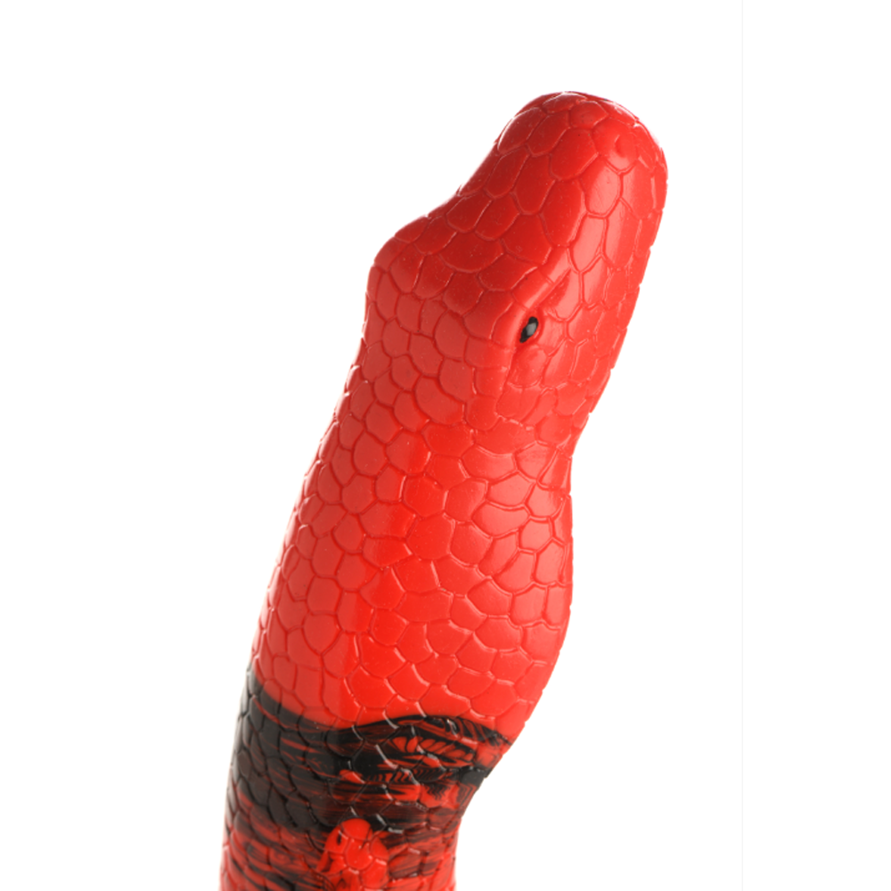 Red silicone King Cobra dildo with textured scales and a suction cup base.