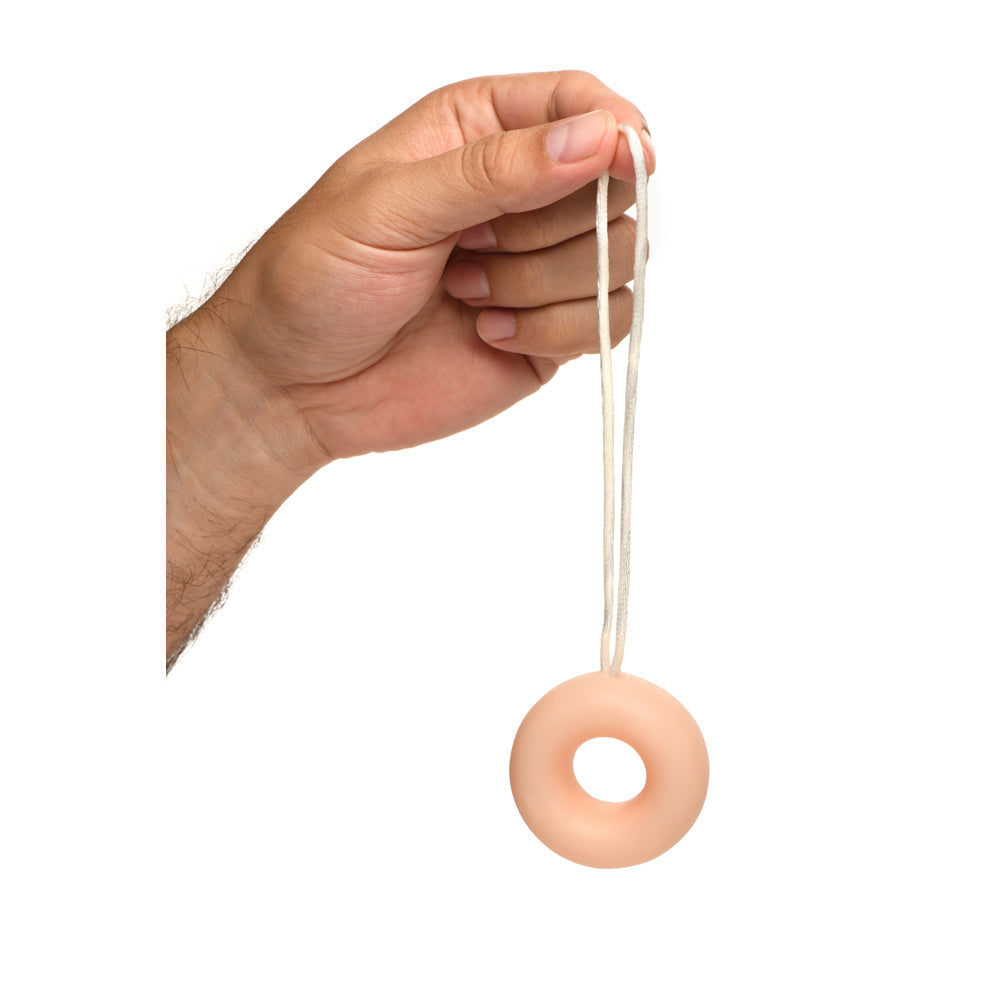 A C-ring shaped novelty soap on a rope.