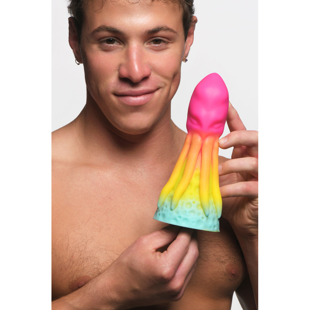 Rainbow silicone dildo with octopus tentacles and suction cup base.