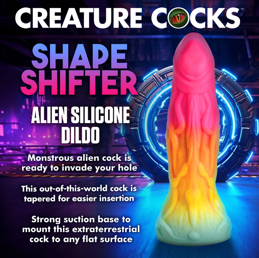 A pink, orange, and yellow gradient alien-shaped silicone dildo with a suction cup base.
