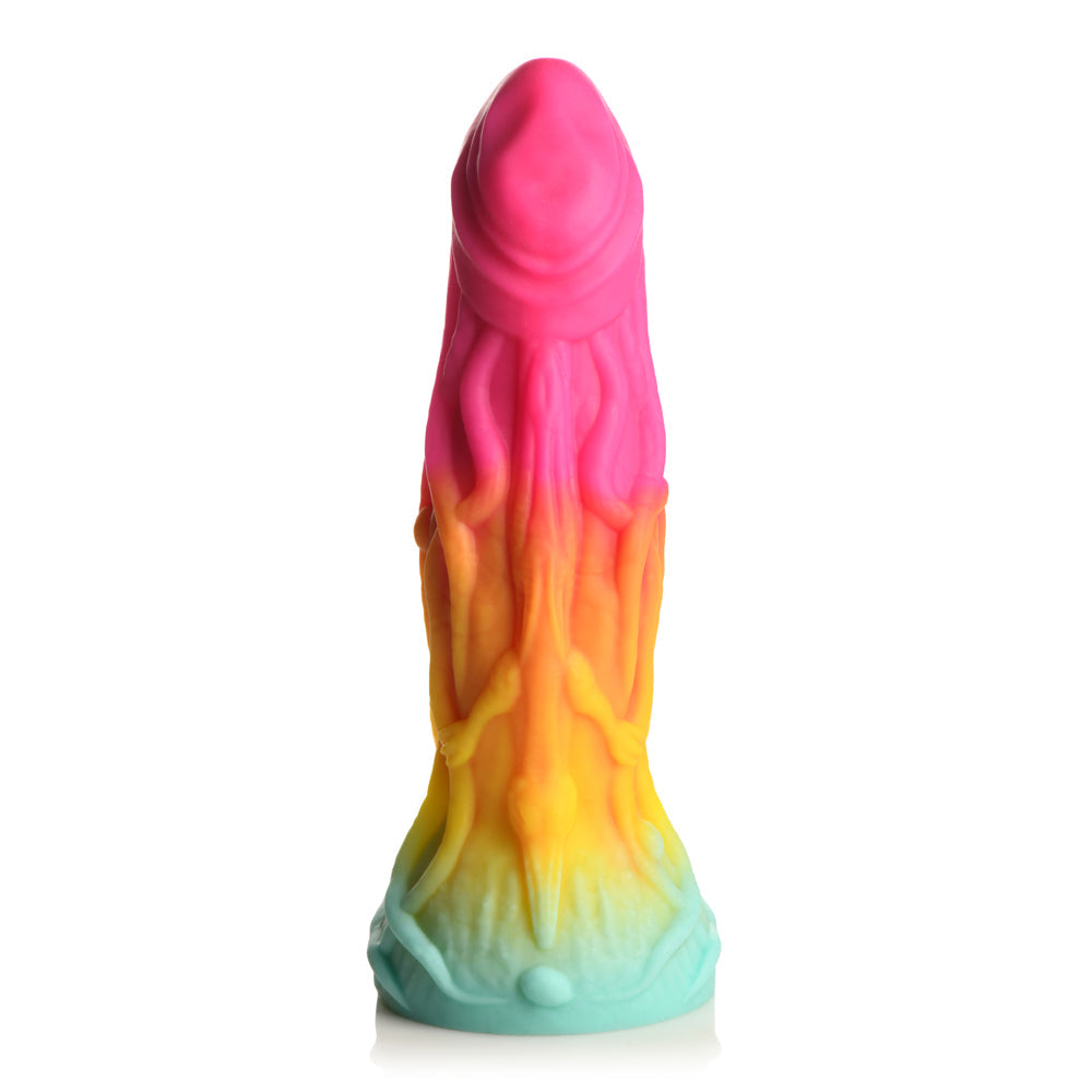 A pink, orange, yellow, and teal silicone dildo with a textured, tentacle-like shaft and a suction cup base.
