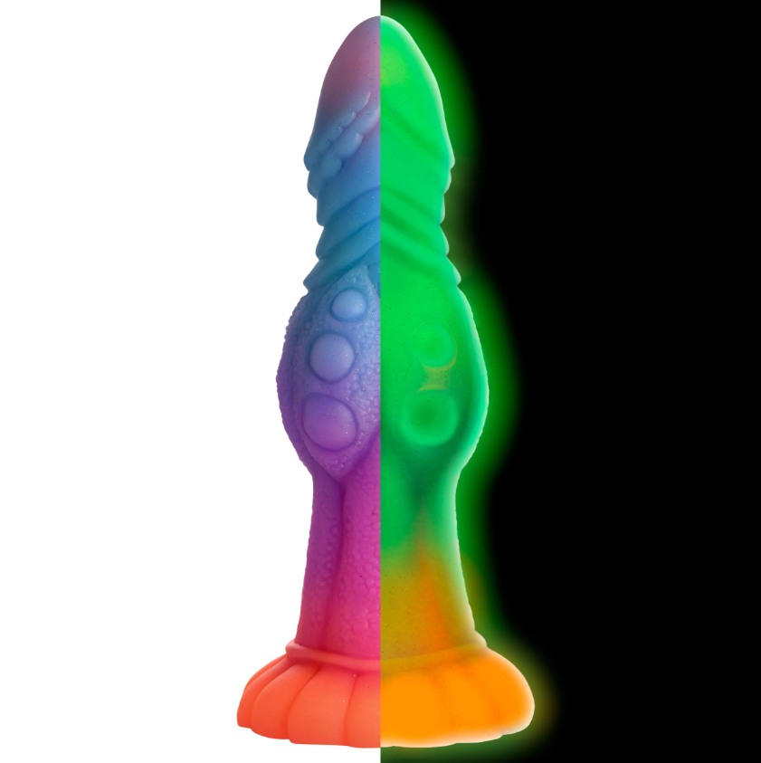 A glow-in-the-dark silicone dildo with a suction cup base in a rainbow of colors.