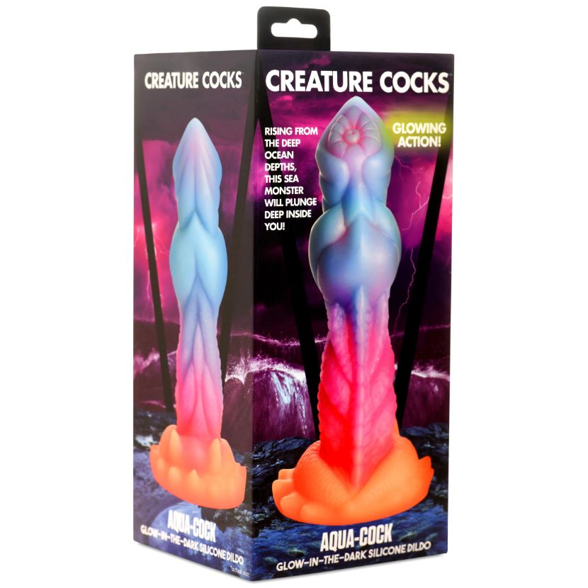 Aqua-Cock glow-in-the-dark silicone dildo with suction cup.