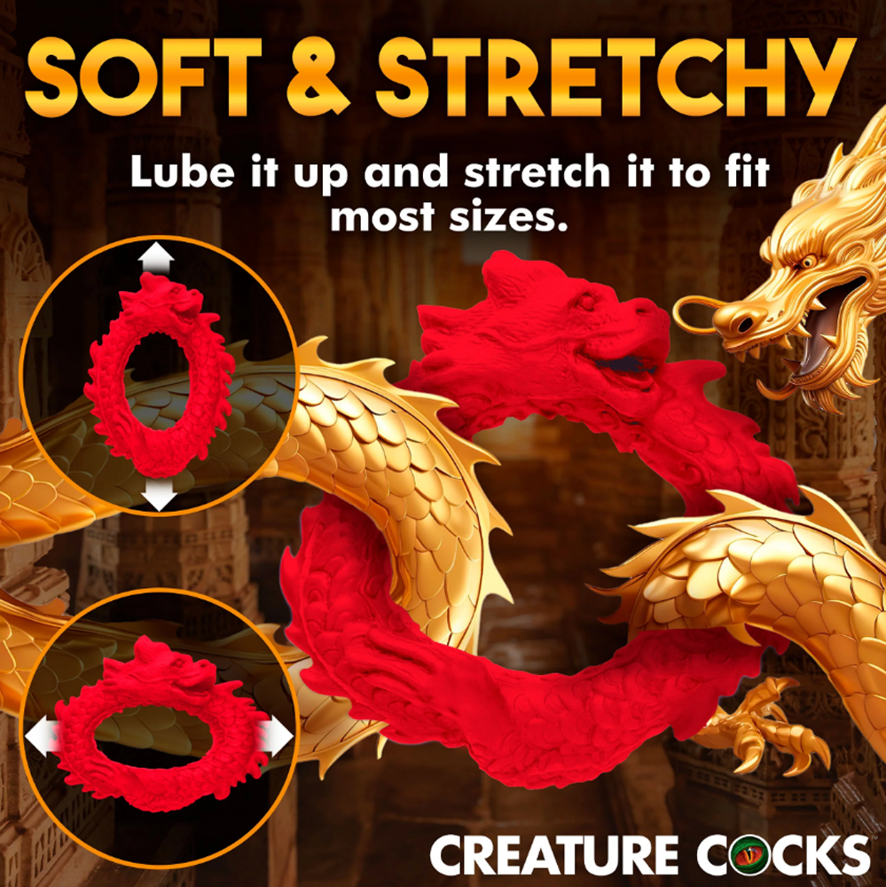 Red dragon-shaped silicone cock ring with stretch indicators.