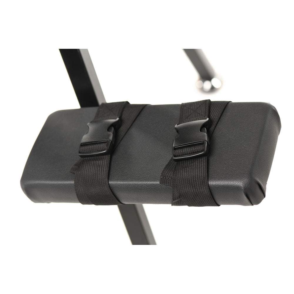 Black obedience bench with straps and buckles.