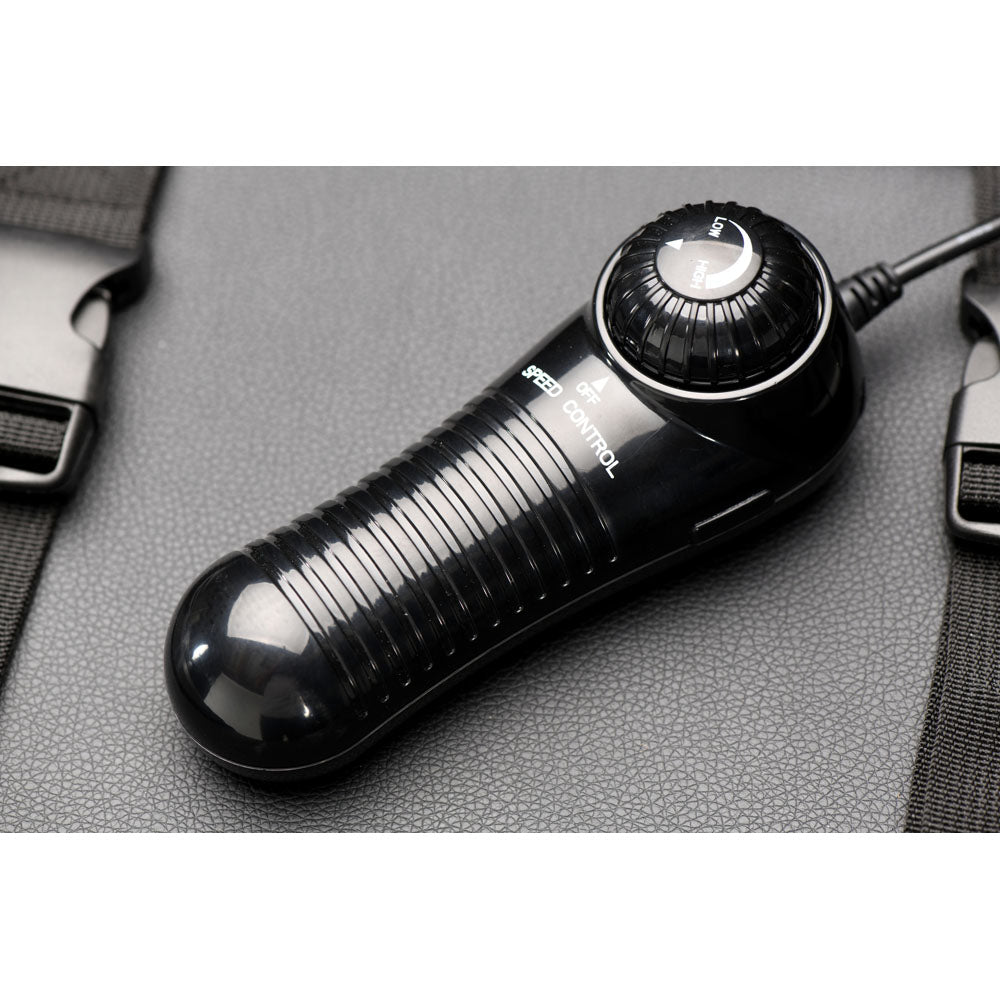 Black speed control for a sex machine with a dial.