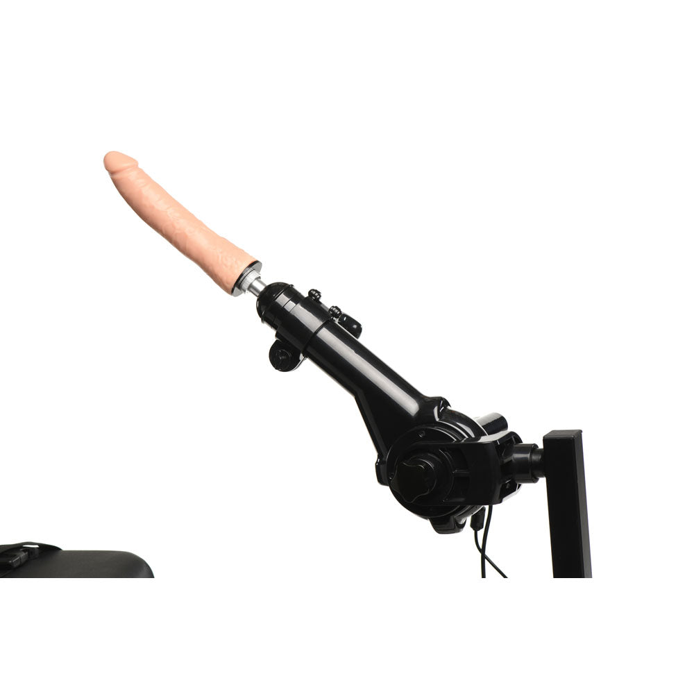 Black sex machine with a pink dildo attached.