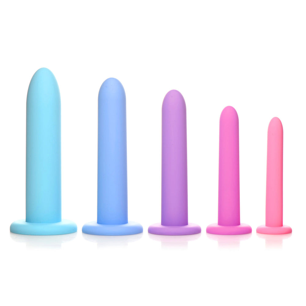 Five silicone dilators in graduated sizes and pastel colors.