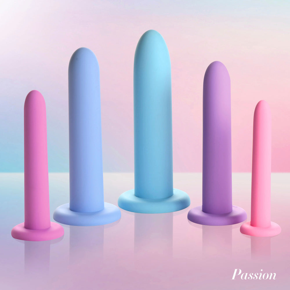 Five silicone dilators in graduated sizes and pastel colors.