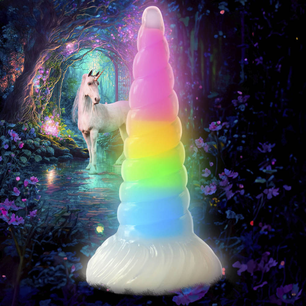A rainbow unicorn horn dildo with a glowing core.