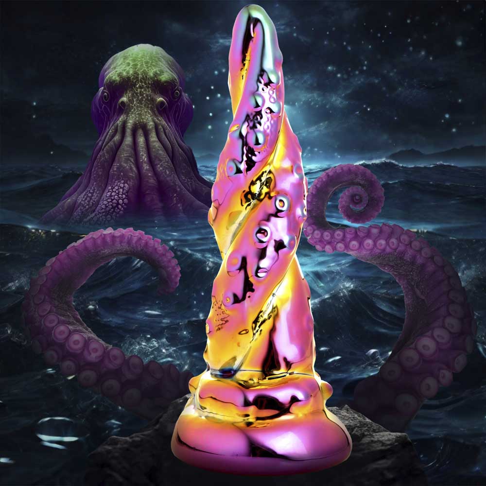 A shimmering pink and gold glass dildo with a twisted tentacle design.