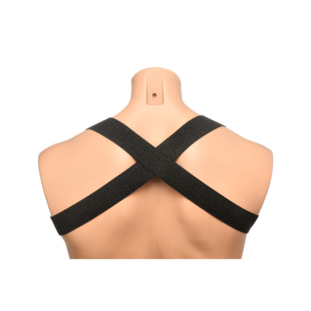 Black chest harness with criss-cross straps on a mannequin.