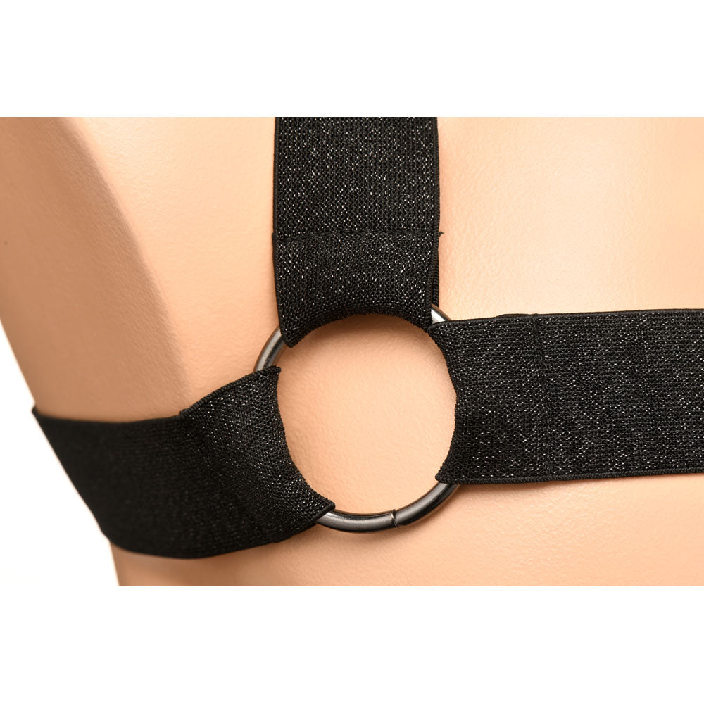 Black stretchy chest harness with a metal ring.