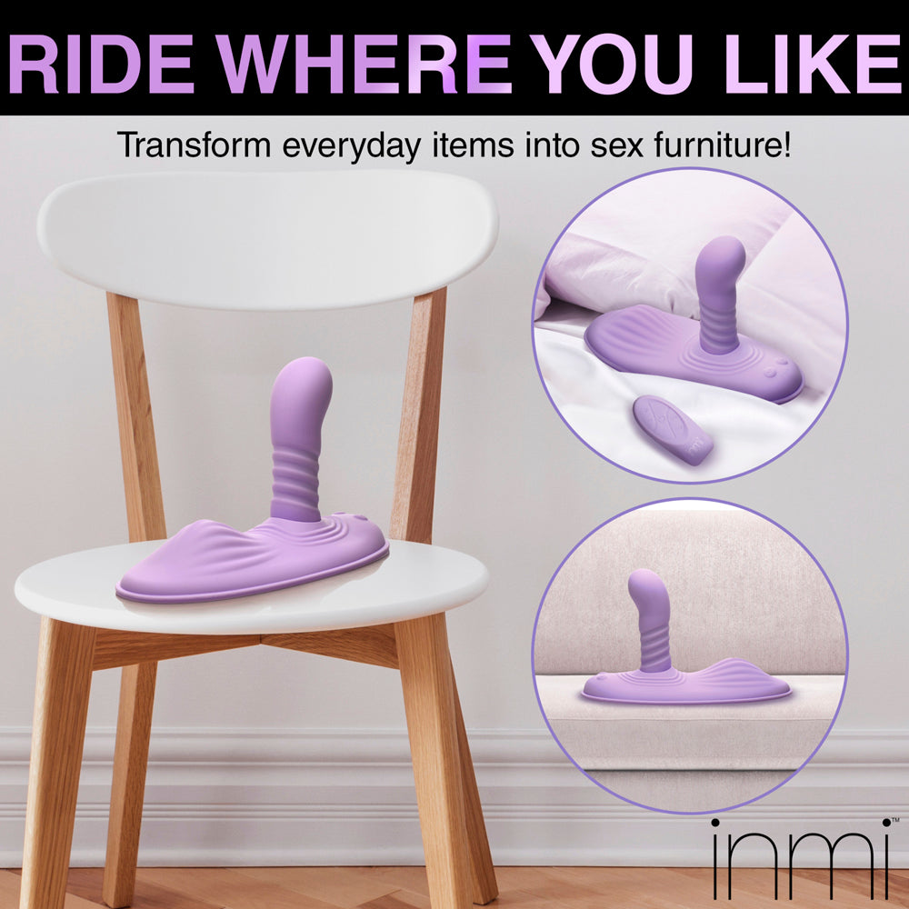 A purple silicone grinding pad with a ribbed dildo attachment sits on a white chair.