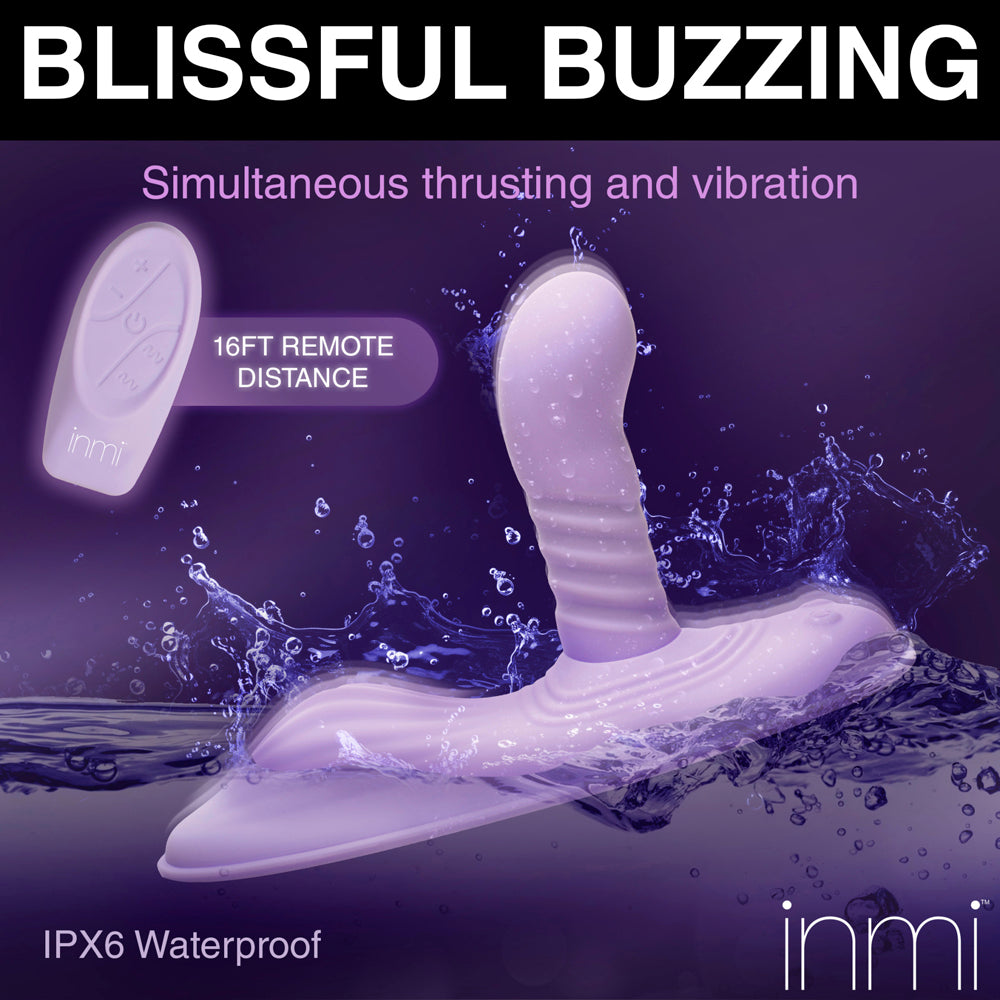 A purple vibrating and thrusting toy with a remote, shown in water.