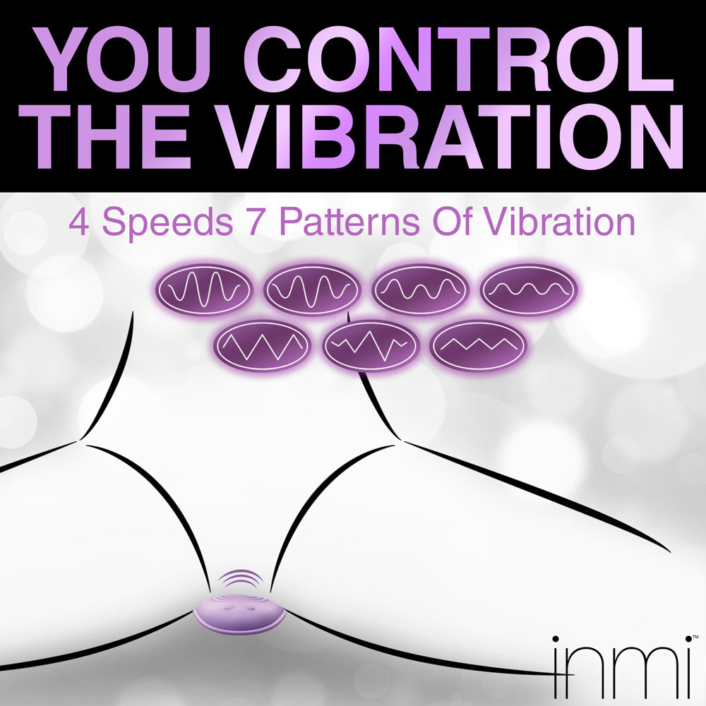 A purple vibrating pad with 7 vibration patterns and a remote control.