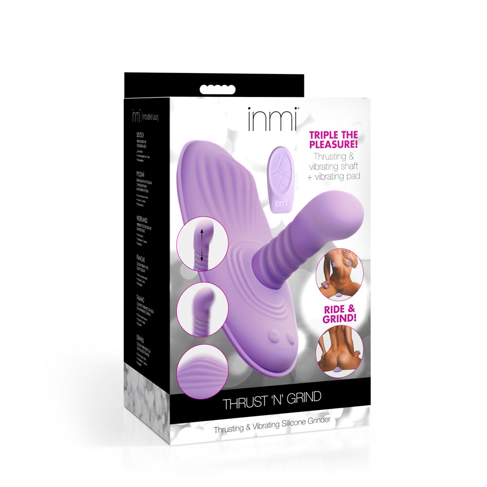 A purple silicone thrusting and vibrating grinding pad with a remote.