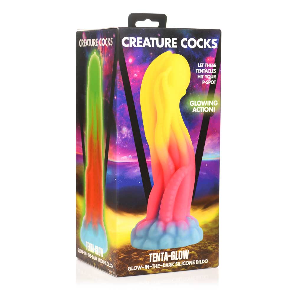 A glow-in-the-dark silicone dildo with tentacles on a box.