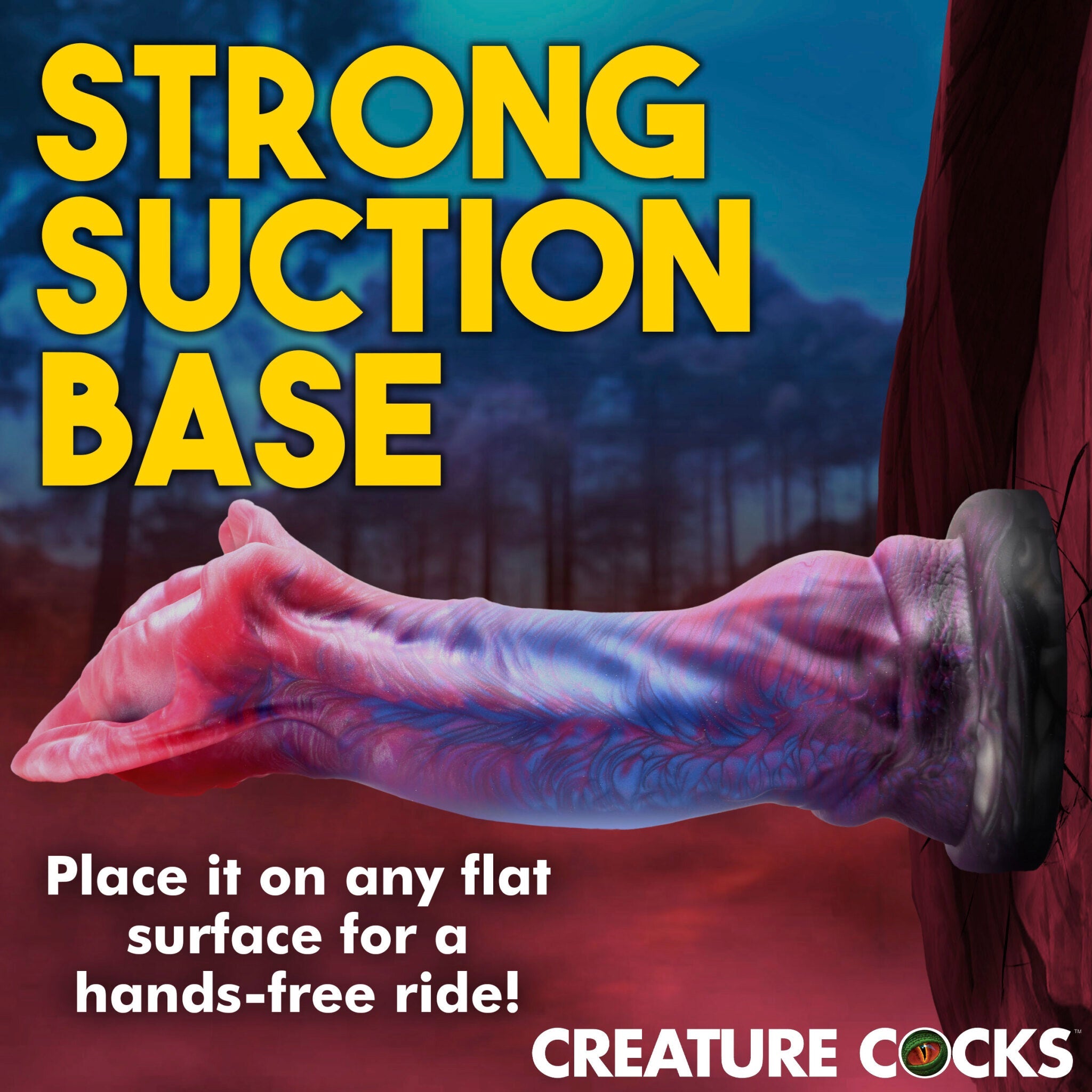 A red and blue silicone dildo with a suction cup base attached to a red surface.