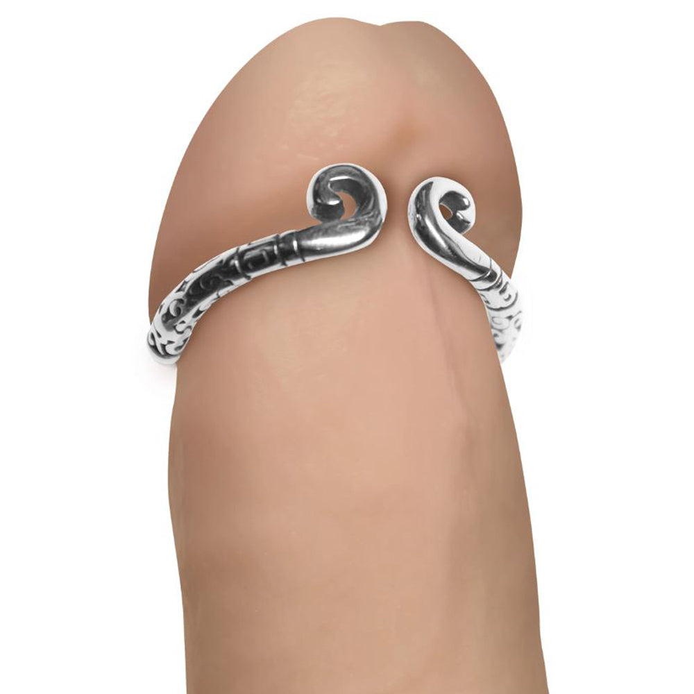 Silver-toned stainless steel adjustable glans ring with ornate scrollwork.
