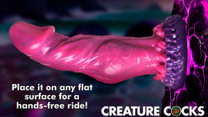 Pink and purple silicone dildo with a suction base and remote-controlled vibrations.