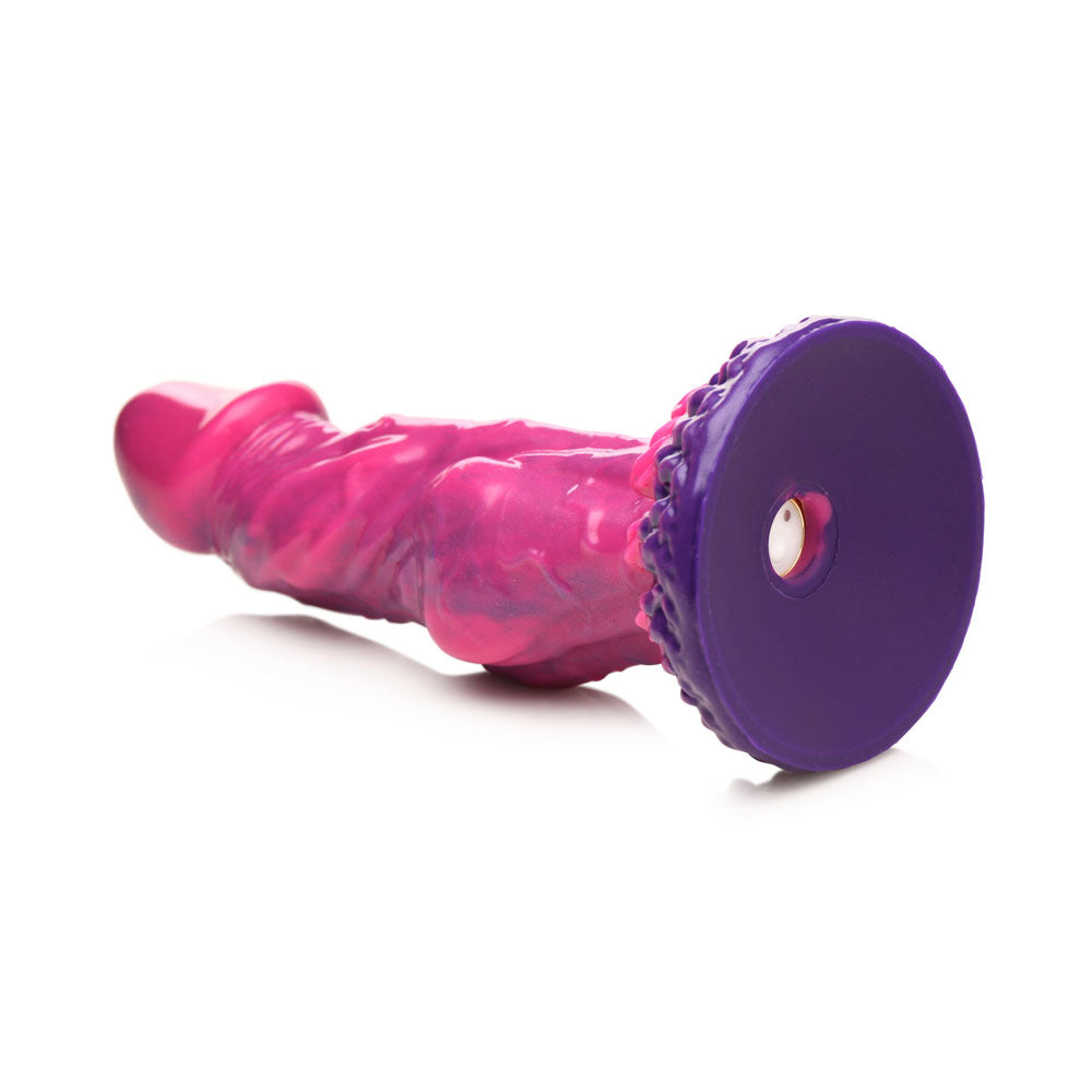 Pink and purple silicone fantasy dildo with vibrating bullet, remote, and suction cup base.